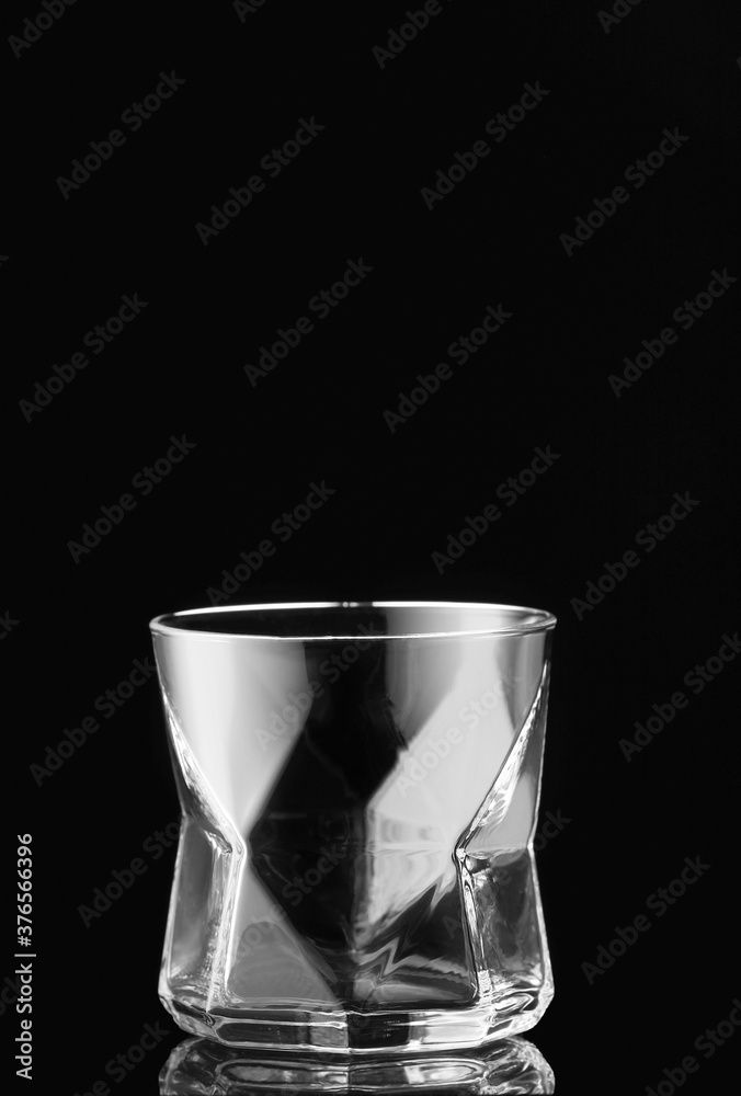 Empty glass on dark background