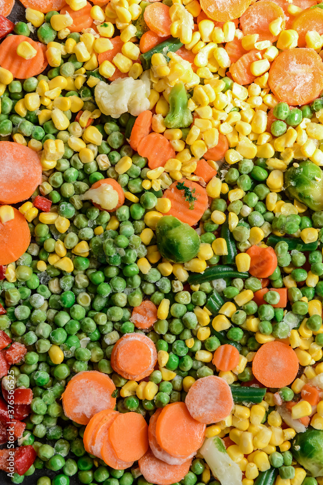 Mix of frozen vegetables as background