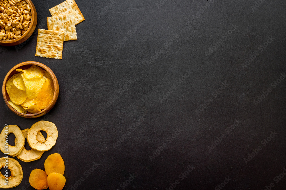 Mix of snacks - nuts and dried fruits, flat lay, top view