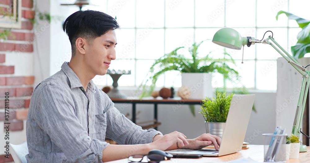 Asian man telework at home