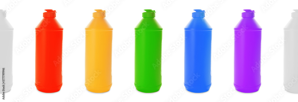 Colorful bottles on white background