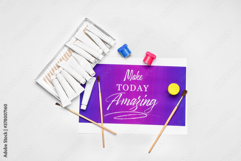 Supplies for calligraphy practice on white background