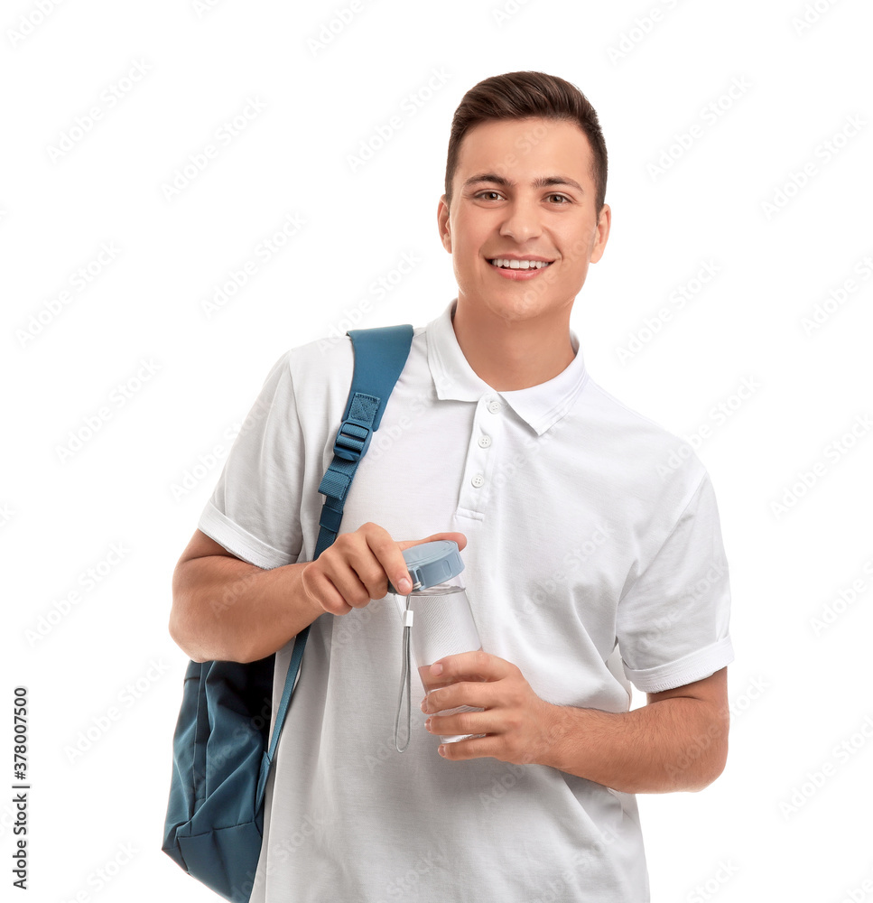 Young man with bottle of water on white background