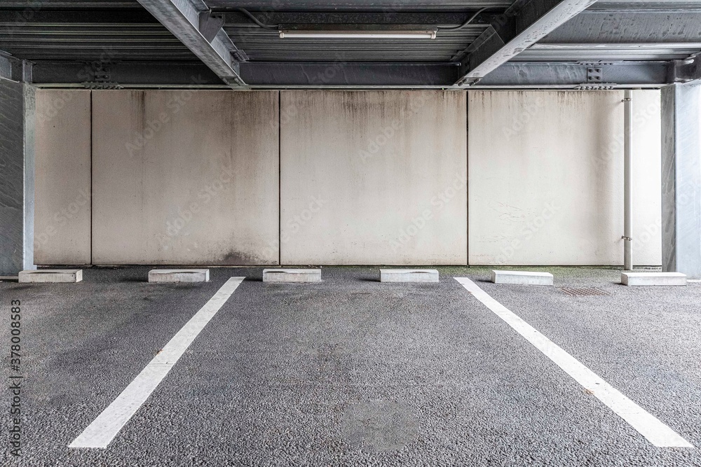 Empty small Parking on the ground floor below the apartment building