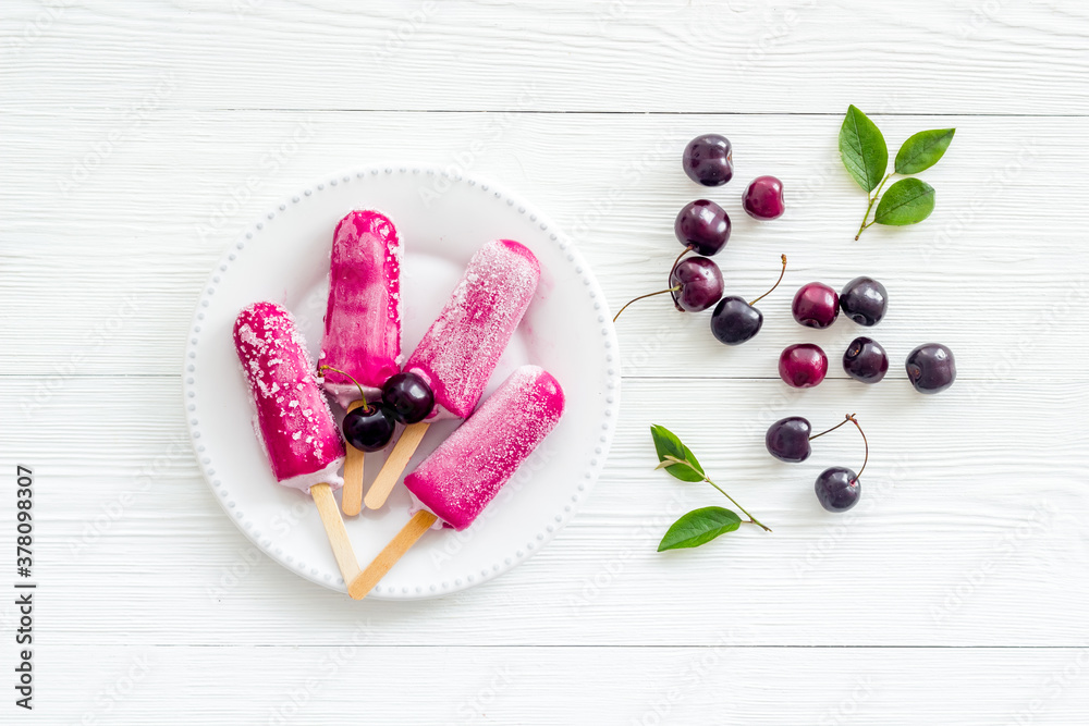 Cherry ice cream popsicles, top view, copy space