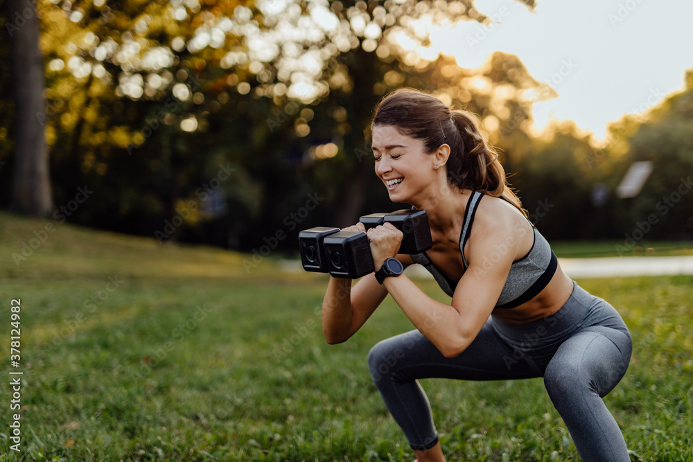 Fit girl doing her leg day training.