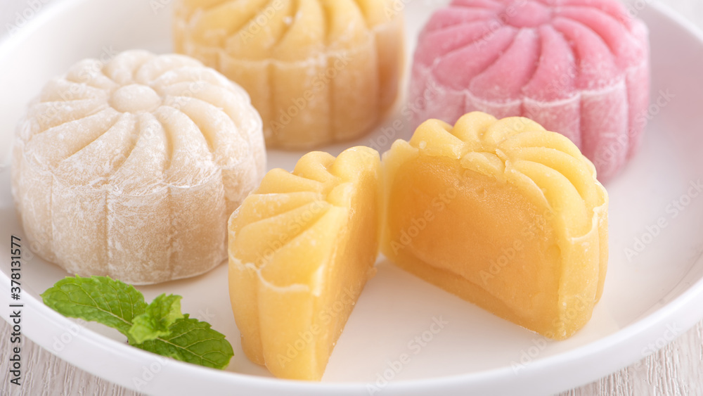 Colorful snow skin moon cake, sweet snowy mooncake, traditional savory dessert for Mid-Autumn Festiv