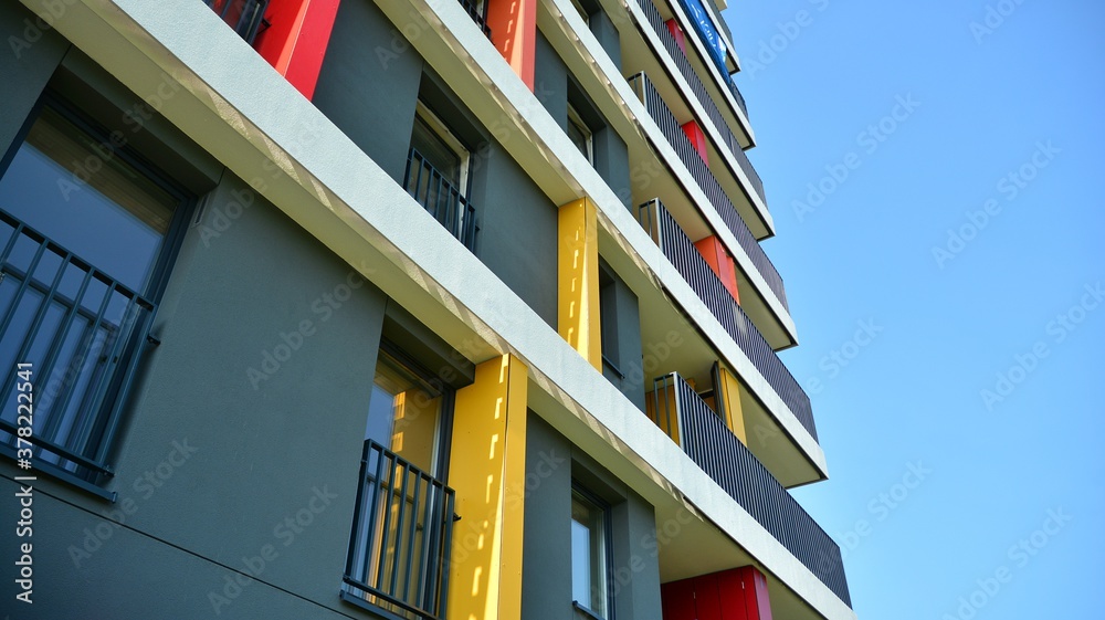 Contemporary residential building exterior in the daylight. Modern apartment buildings on a sunny da