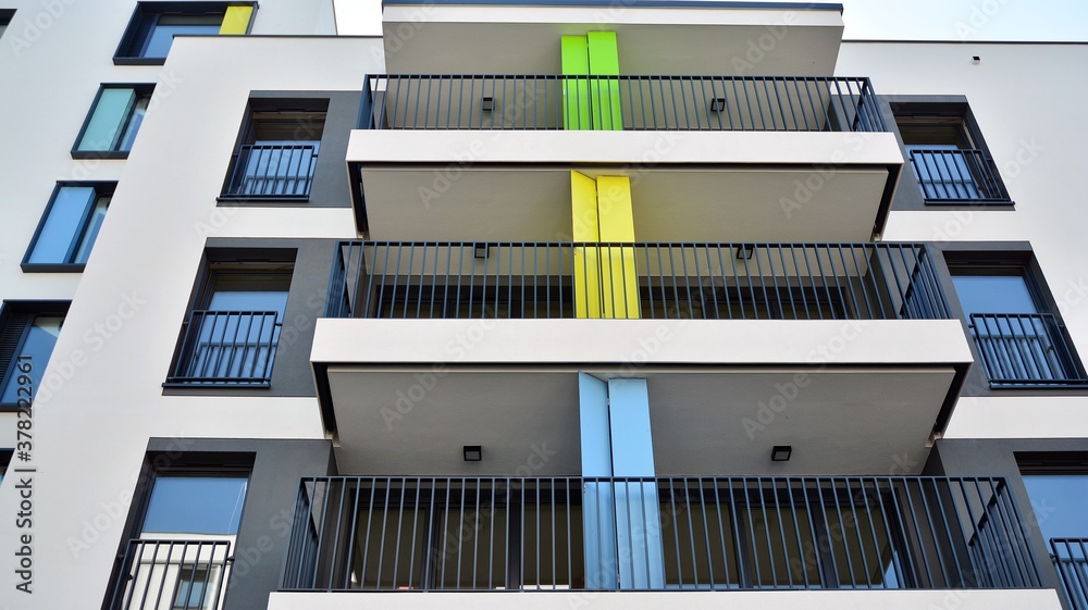 Contemporary residential building exterior in the daylight. Modern apartment buildings on a sunny da