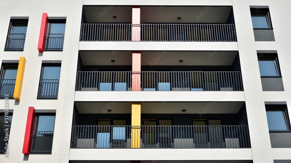 Contemporary residential building exterior in the daylight. Modern apartment buildings on a sunny da