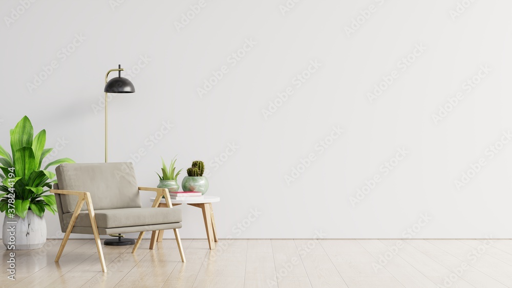 White wall with armchair in living room.