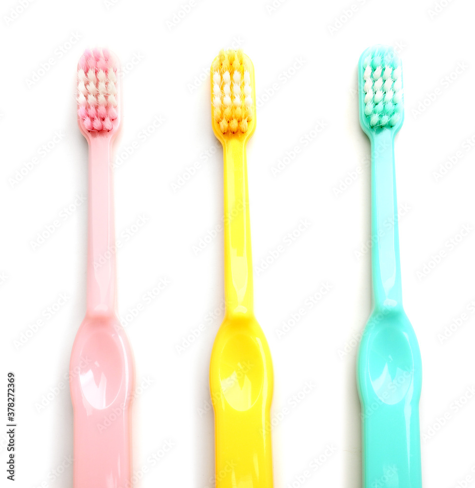 Tooth brushes on white background