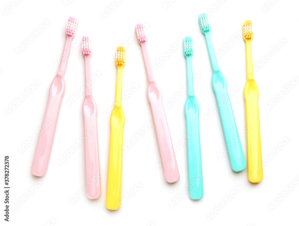 Tooth brushes on white background