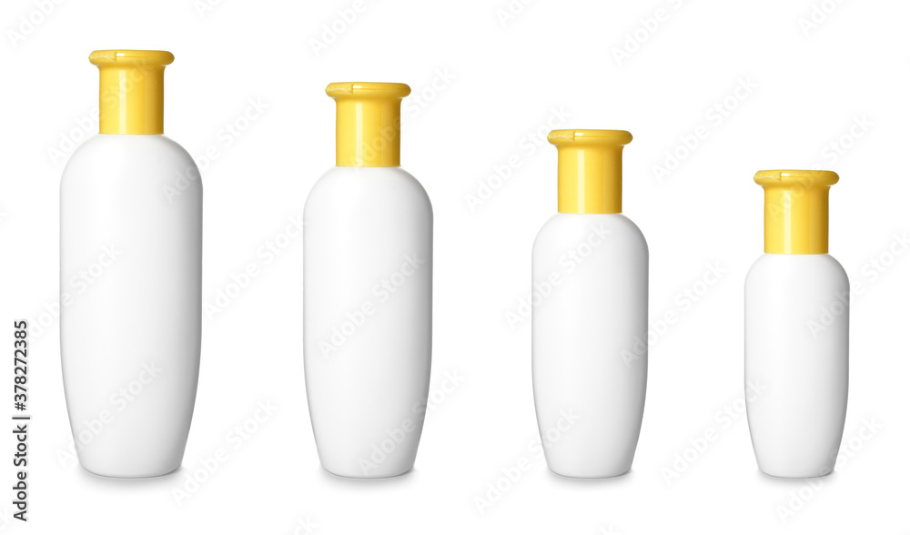 Plastic bottles of different sizes on white background