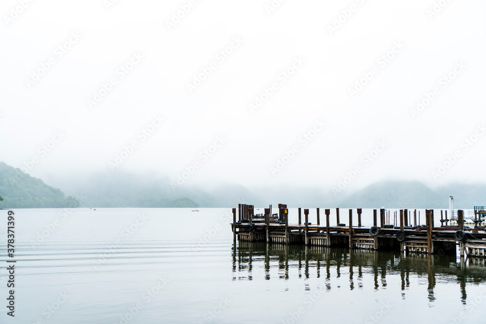 Mist over the Pier and Lake in Japan