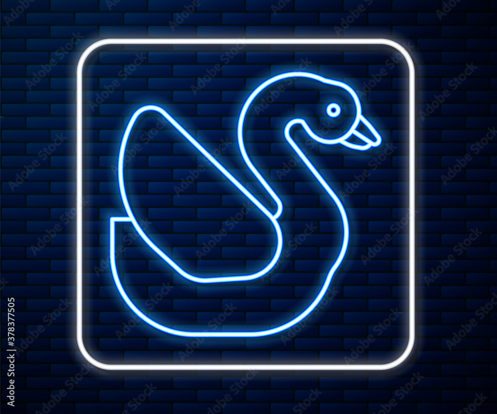 Glowing neon line Swan bird icon isolated on brick wall background. Animal symbol. Vector.