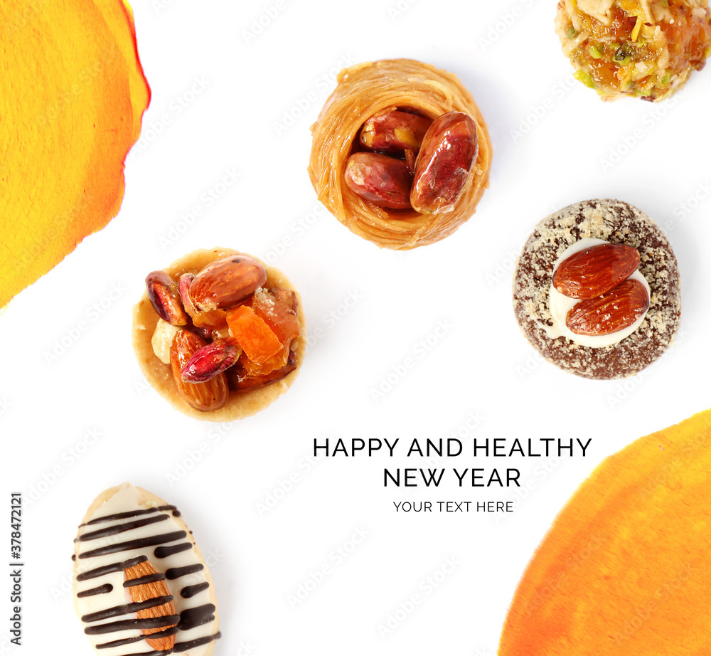 Creative happy and healthy new year card made of baklava on the white background. Desserts happy new