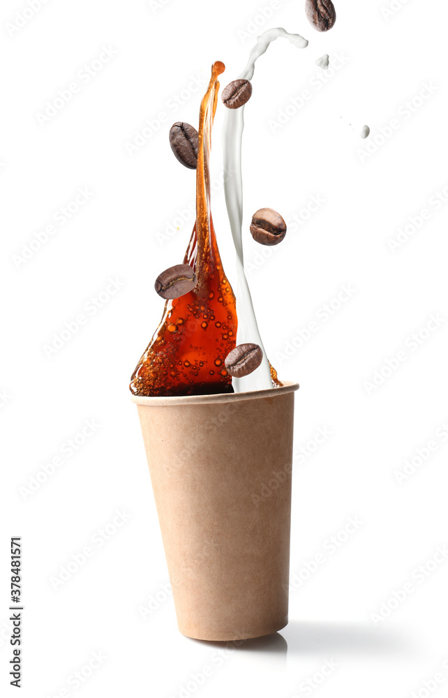 Splashing of coffee and milk in cup on white background