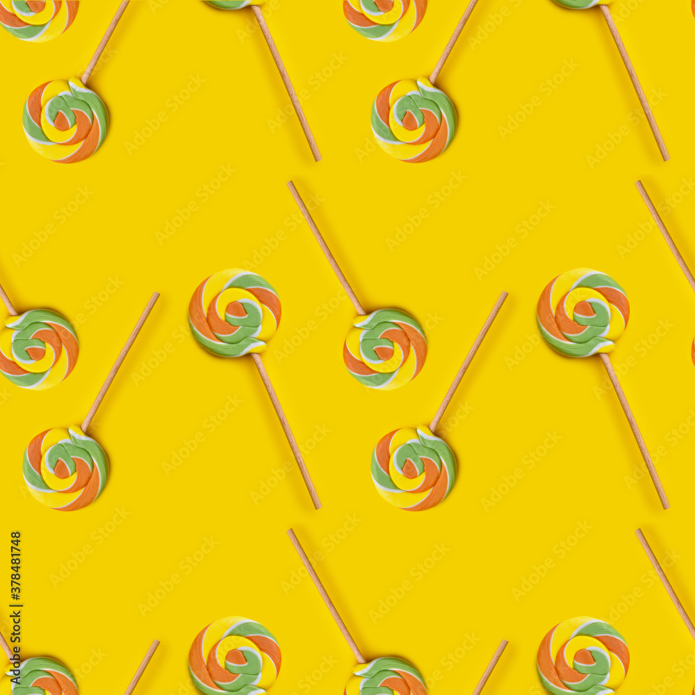 Tasty lollipops on color background