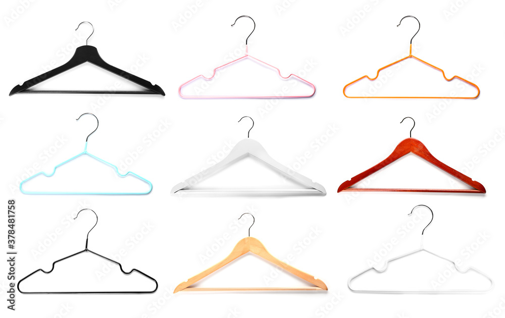 Set of clothes hangers on white background