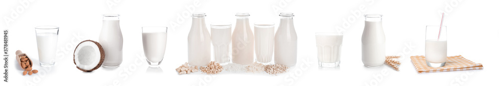 Glassware of different vegan milk on white background