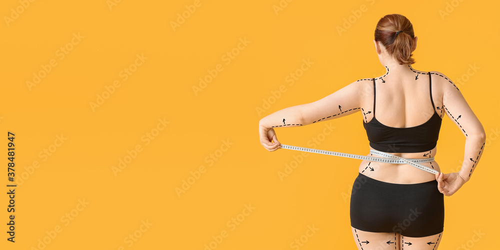 Overweight woman with measuring tape on color background, back view. Weight loss concept