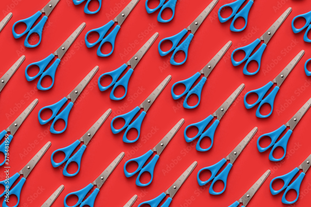 Many school scissors on color background