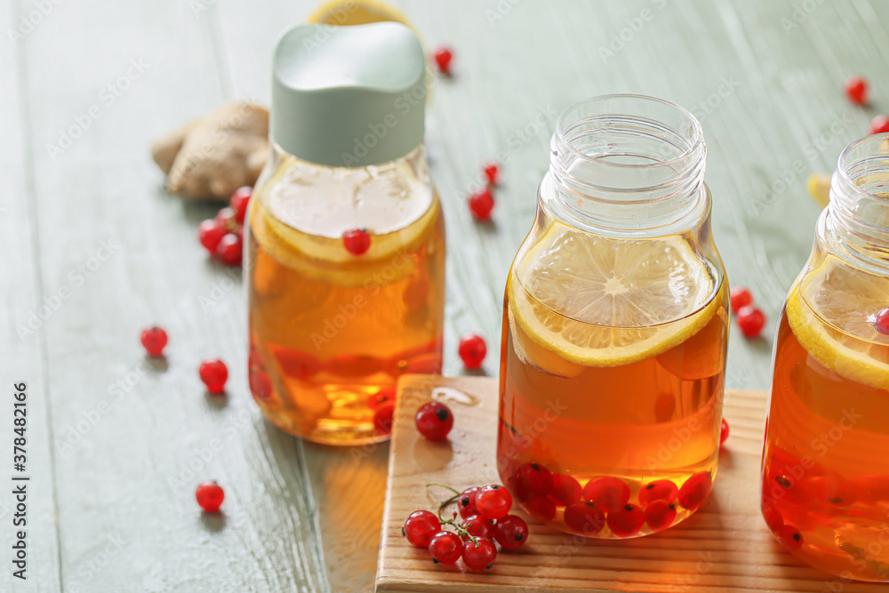 Bottles of fresh ice tea on table