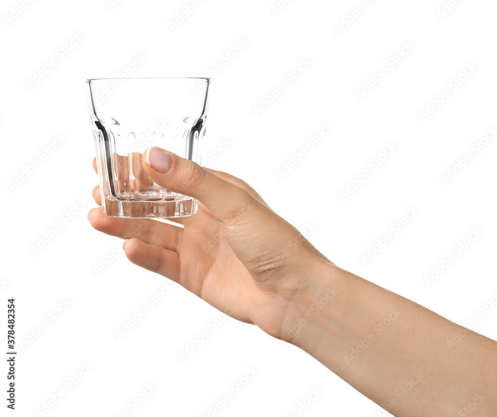 Hand with empty glass on white background