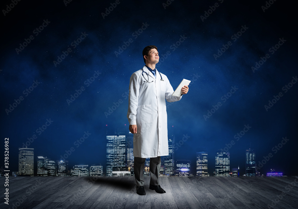 Doctor with a computer tablet