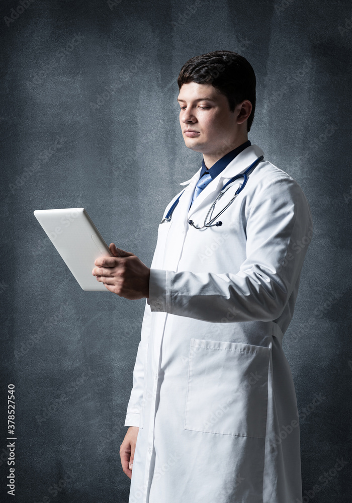 Doctor with a computer tablet