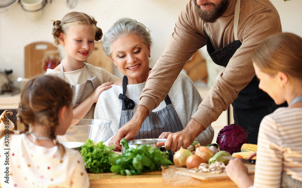 Happy united family preparing healthy lunch together.