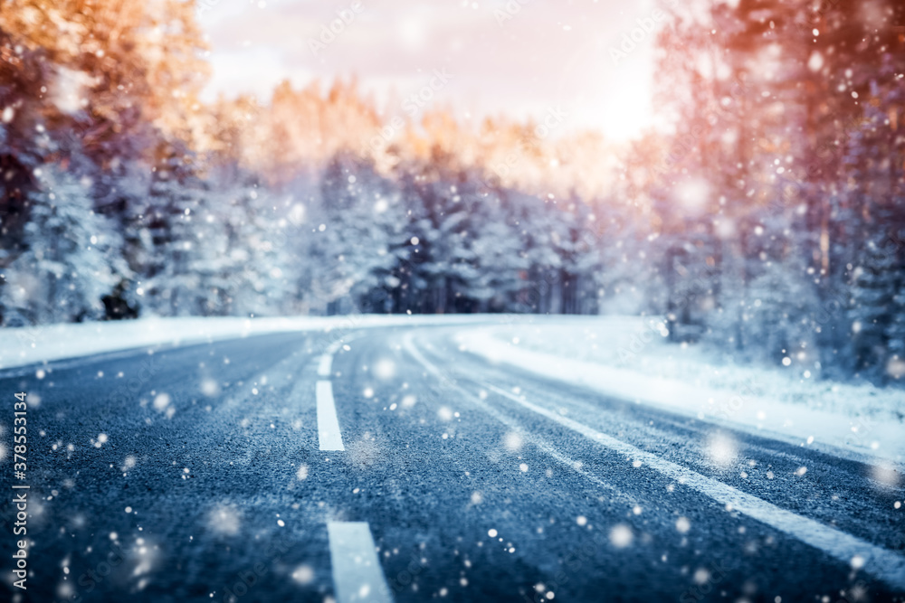 winter road, covered with snow on sunny day