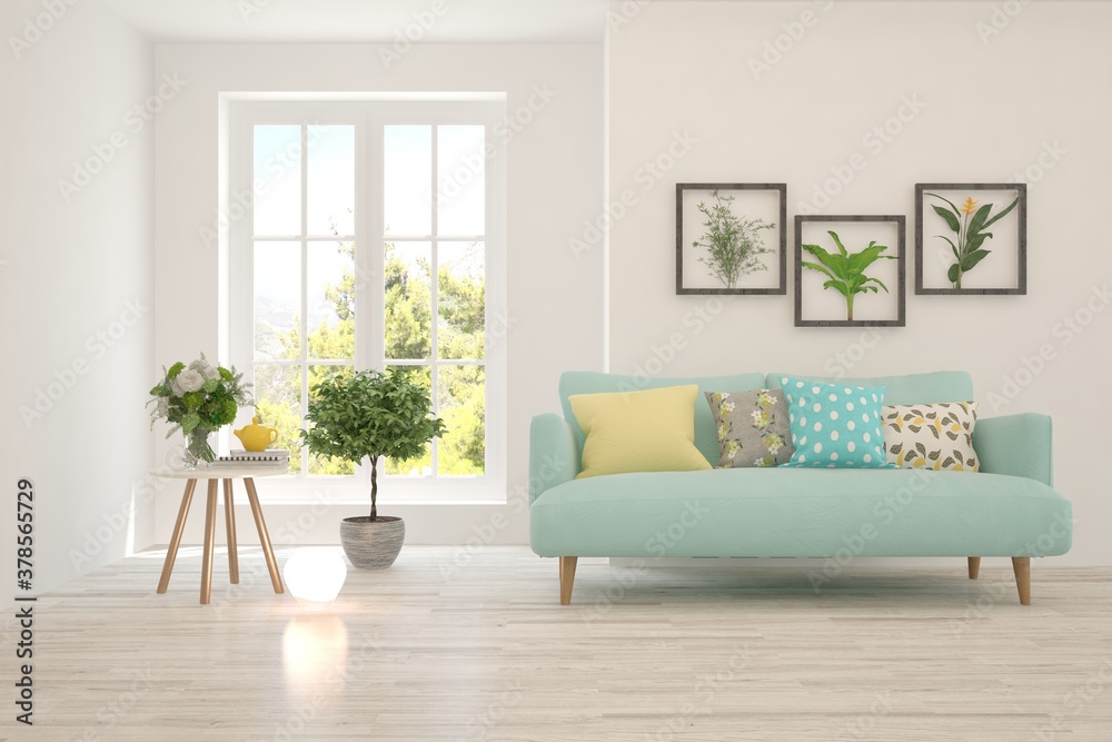 Stylish room in white color with sofa and autumn landscape in window. Scandinavian interior design. 