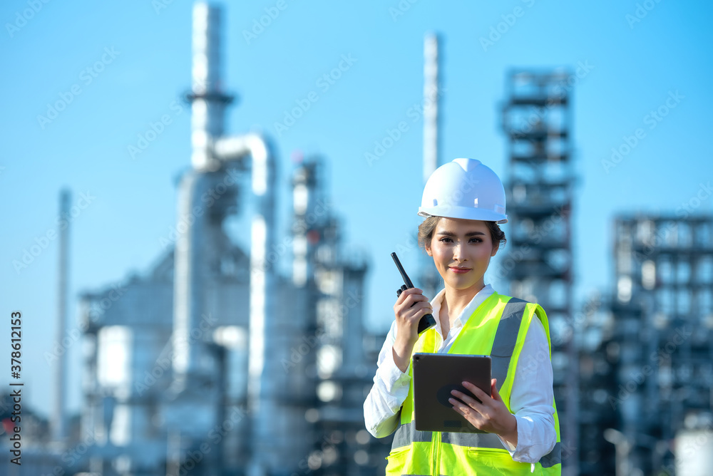 Engineer inspecting in industrial oil refinery. Industry 4.0 concept. Background blurred concept.