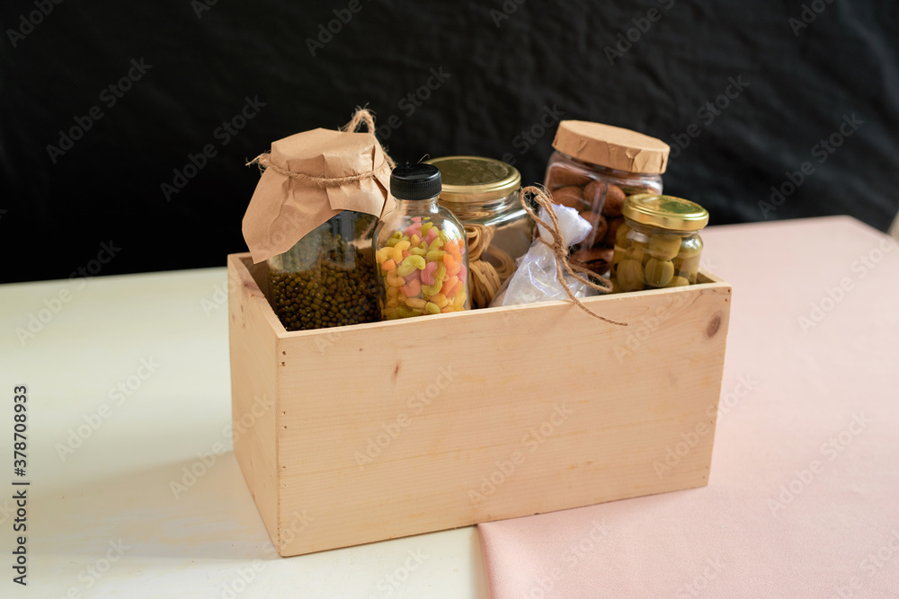 Food donations box isolated on table