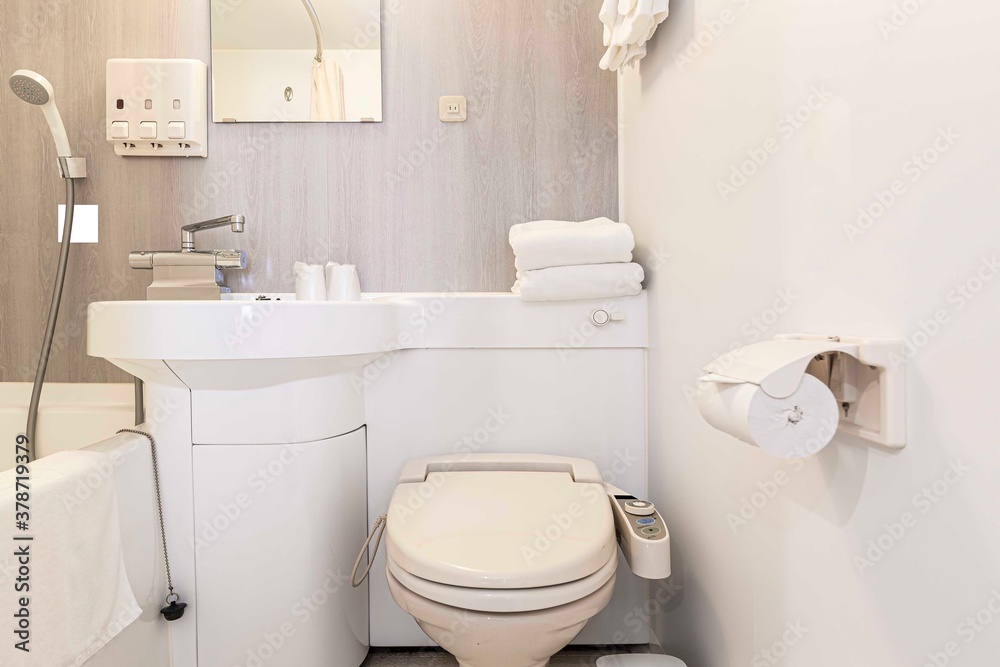 Modern automatic toilet In a small toilet in a wooden house