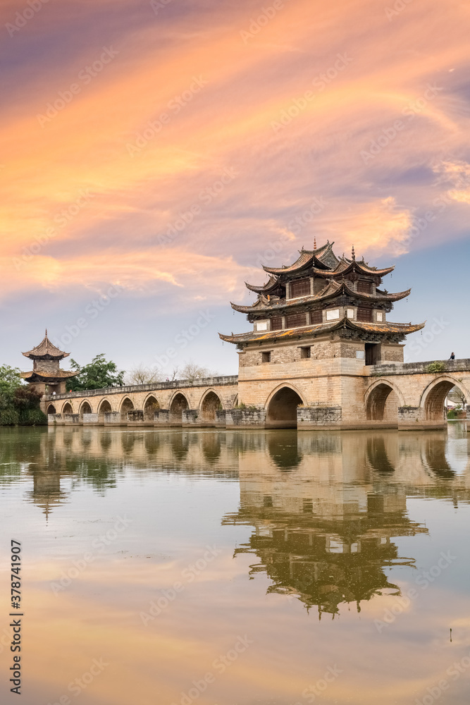 yunnan double dragon bridge at dusk