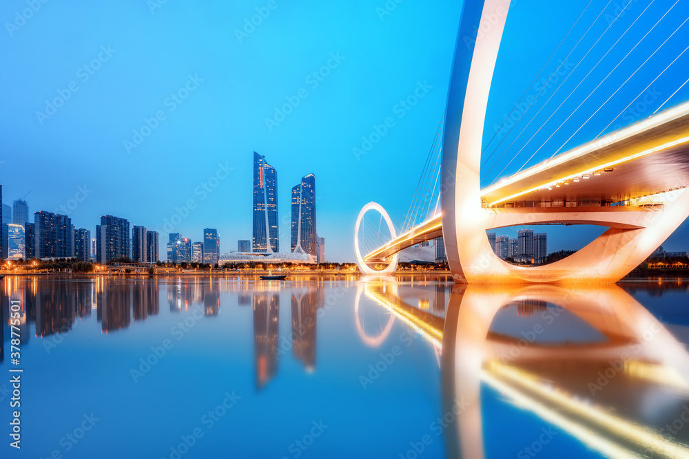 China Nanjing city skyline and modern buildings, twilight landscape.