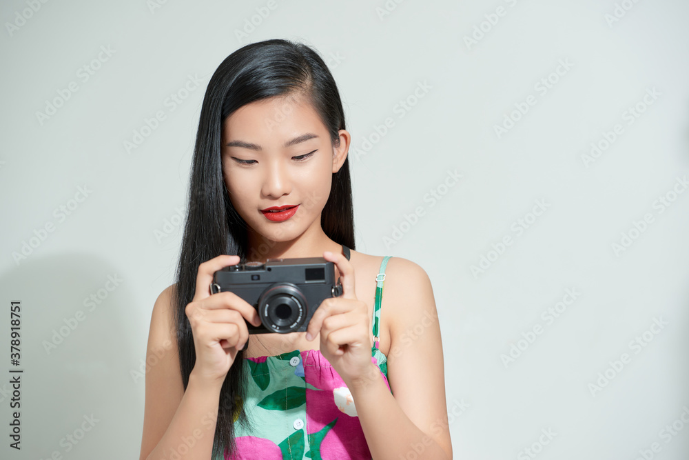 attractive young female happy ready to go on vacation, isolated on white background