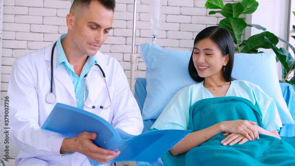 Doctor in professional uniform examining patient at hospital or medical clinic. Health care , medica