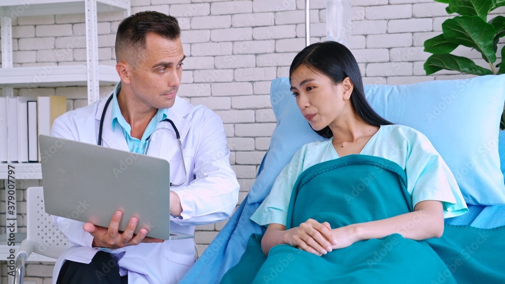 Doctor in professional uniform examining patient at hospital or medical clinic. Health care , medica