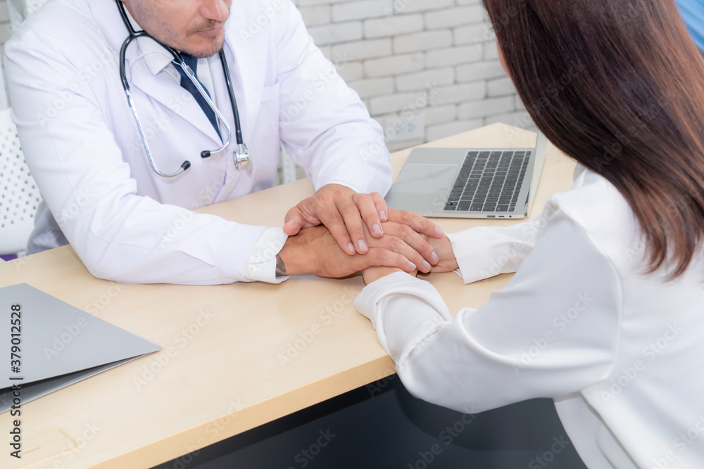 Doctor in professional uniform examining patient at hospital or medical clinic. Health care , medica