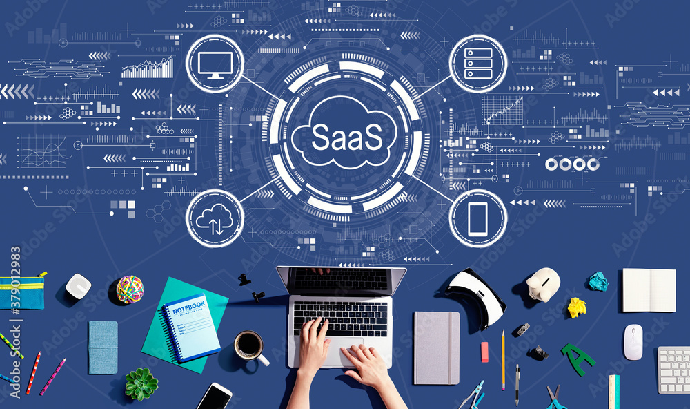 SaaS - software as a service concept with person using a laptop computer