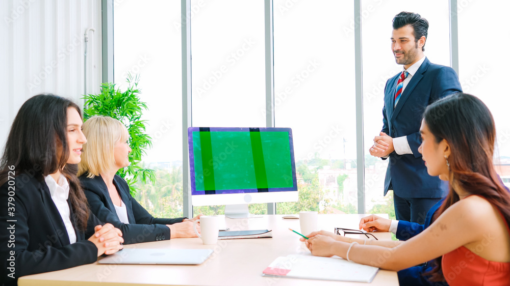 Business people in the conference room with green screen chroma key TV or computer on the office tab