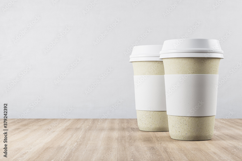 Two disposable recycle white paper cup of coffee