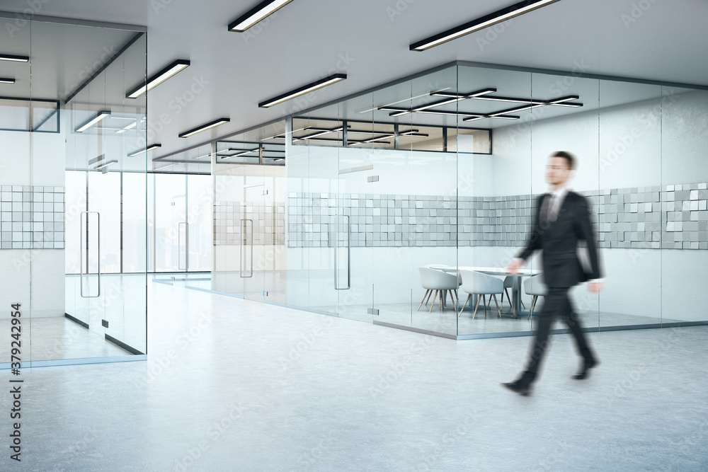 Businessman walking in conference interior with abstract tiles on wall