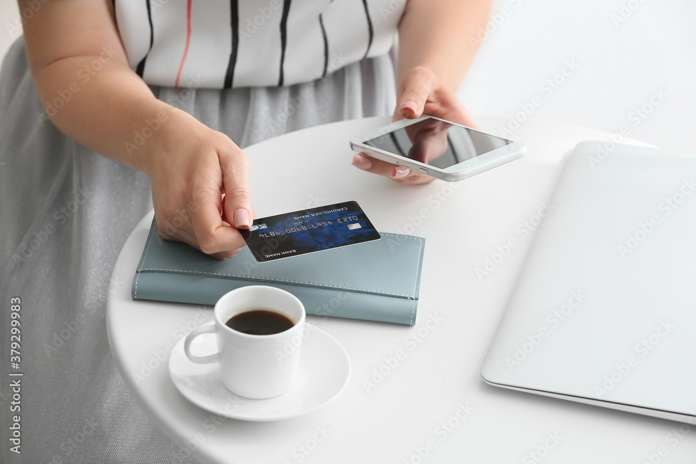 Young woman shopping online at home