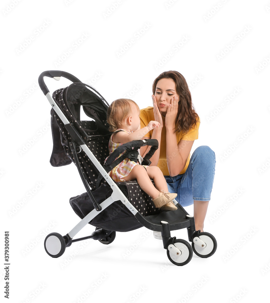 Woman and her cute baby in stroller on white background