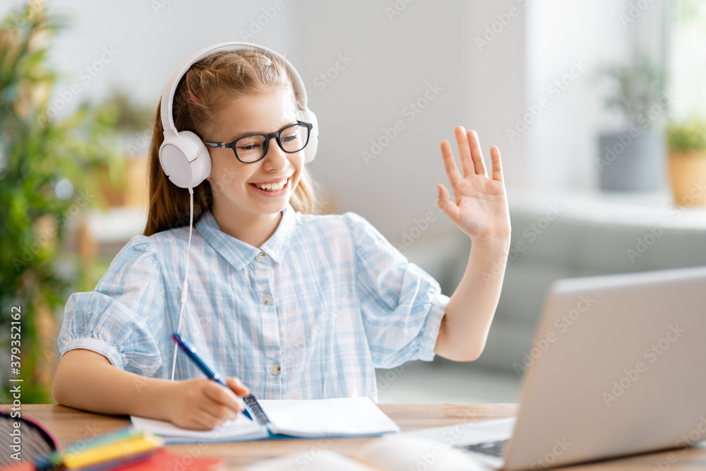 Girl doing homework or online education.